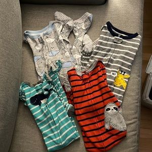 Four Pairs of Carter’s Footsie Pajamas